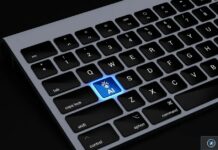 Apple Books touché à son tour par la vague de faux livres générés par IA Clavier d’ordinateur avec touche AI illuminée en bleu
