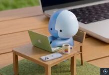 Apple montre les débuts de Lil’ Finder Guy, la mascotte du MacBook Neo Mascotte bleue travaillant sur un MacBook miniature