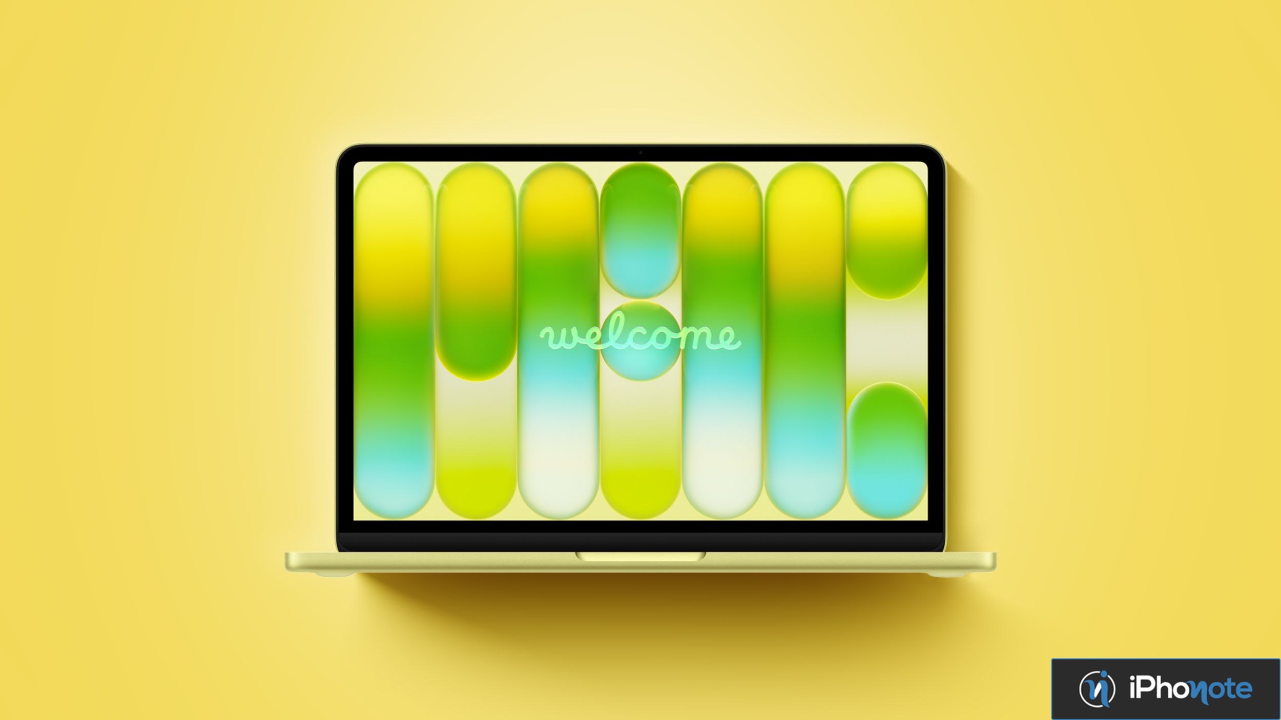 MacBook jaune avec écran d’accueil abstrait