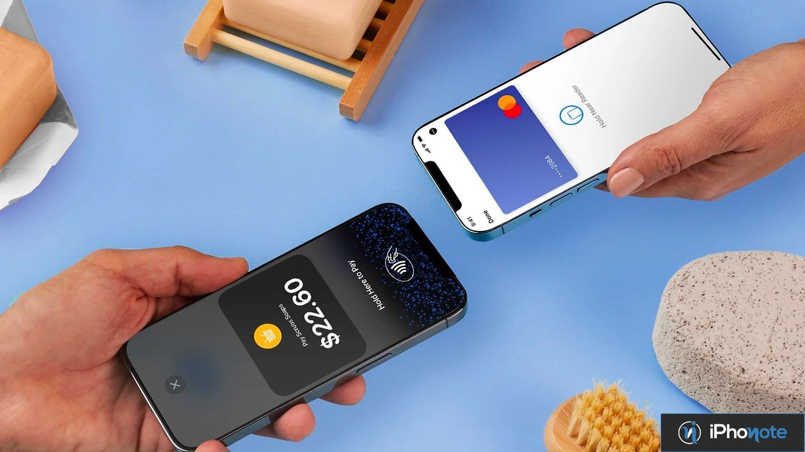 Deux iPhone réalisent un paiement sans contact rapproché