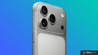 iPhone argenté vu de trois quarts sur fond bleu
