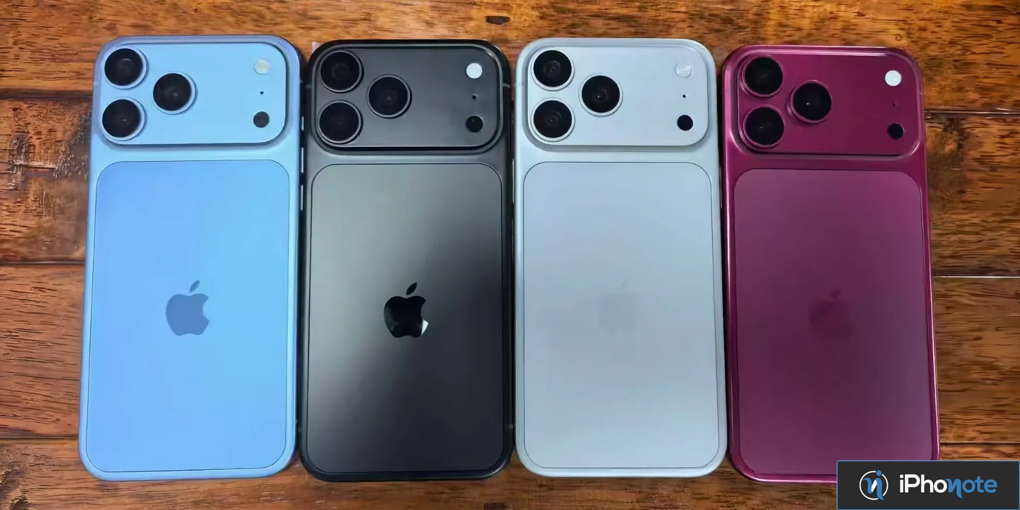 Quatre iPhone Pro vus de dos, dont un modèle bordeaux